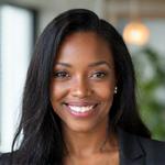 Professional headshot of Lisa Thompson, an approachable and energetic woman.