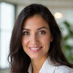 Professional headshot of Dr. Sarah Martinez, a compassionate and intelligent woman.